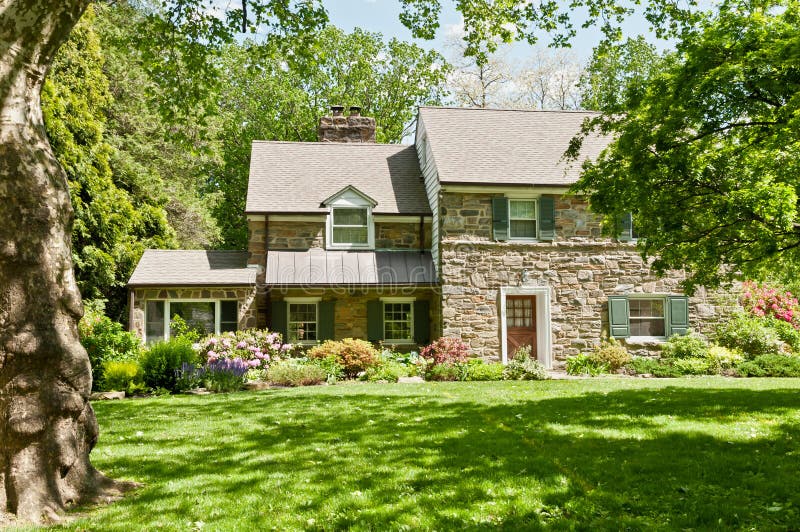 Upscale family house with green lawn in Philadelphia suburbs, Pennsylvania, USA. Upscale family house with green lawn in Philadelphia suburbs, Pennsylvania, USA.