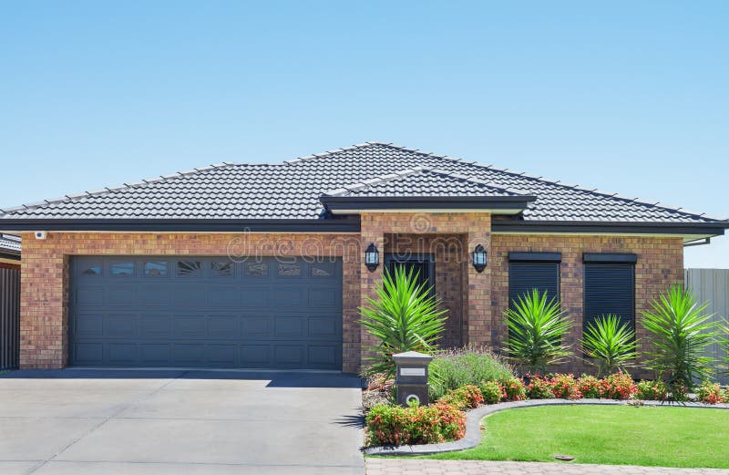 Typical facade of a modern suburban house. Typical facade of a modern suburban house