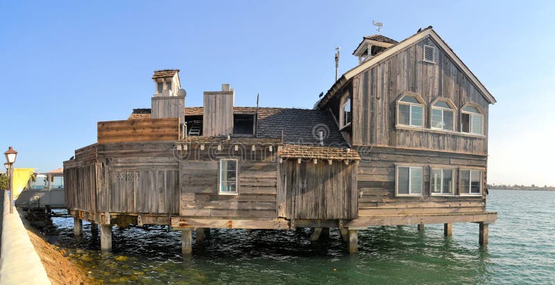 Wooden house on stilts - palafito - suspended above the sea in Castro, Chiloe Island, Chile. Wooden house on stilts - palafito - suspended above the sea in Castro, Chiloe Island, Chile