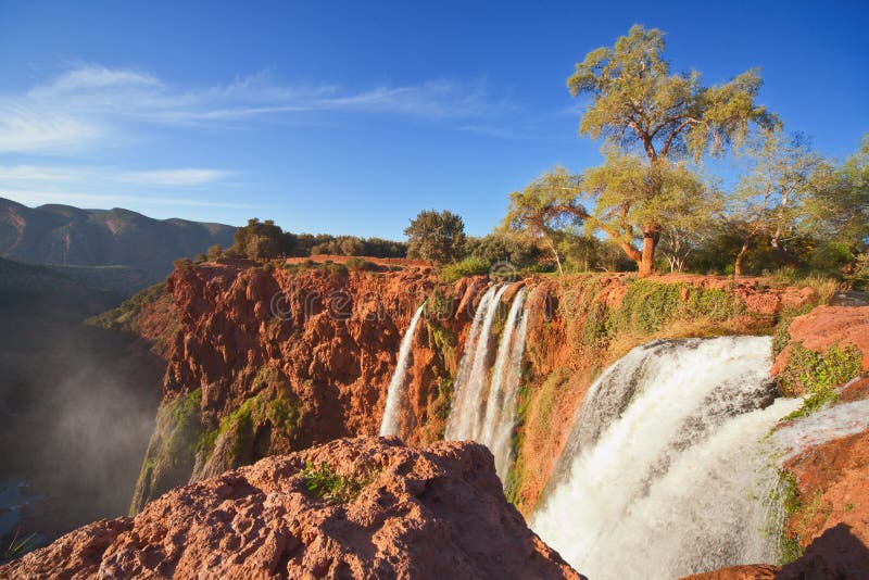 Ouzoud Waterfalls are located in the Grand Atlas village of Tanaghmeilt, in the province of Azilal, north-east of Marrakech, in Morocco. Ouzoud Waterfalls are located in the Grand Atlas village of Tanaghmeilt, in the province of Azilal, north-east of Marrakech, in Morocco.