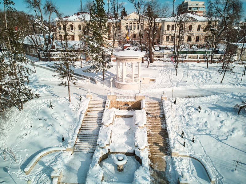 Cascades ladder in Valea Morilor park covered in snow. Aerial shot. Chisinau, Moldova