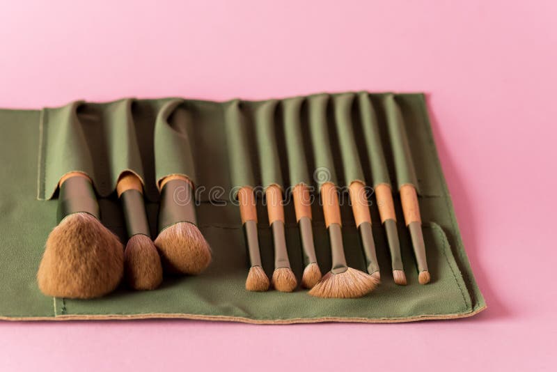 Case Makeup Artist Set of Brushes Powder Foundation Pink Background Horizontal Stock Photo
