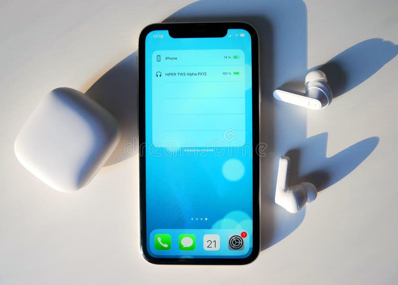 White Wireless Headphones. the Case of TWS Headphones is Made of White