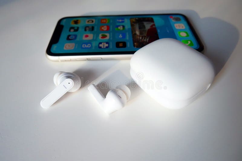 White Wireless Headphones. the Case of TWS Headphones is Made of White