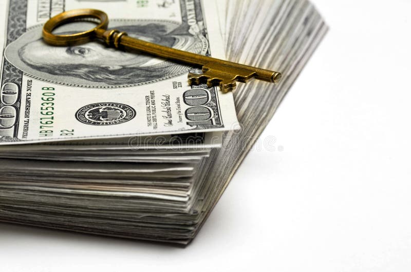Cash and Key for Wealth and Riches royalty free stock photography