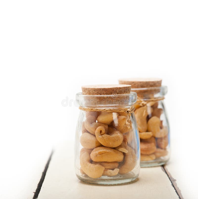 Cashew nuts on a glass jar stock image. Image of anacardium 68673429