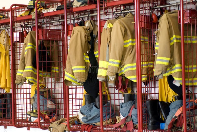 Fireman coats and boots wait for the next call. Fireman coats and boots wait for the next call