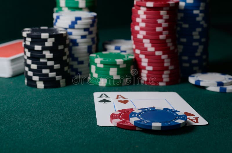 Casino Chips And Pair Of Aces On The Green Table. Poker ...