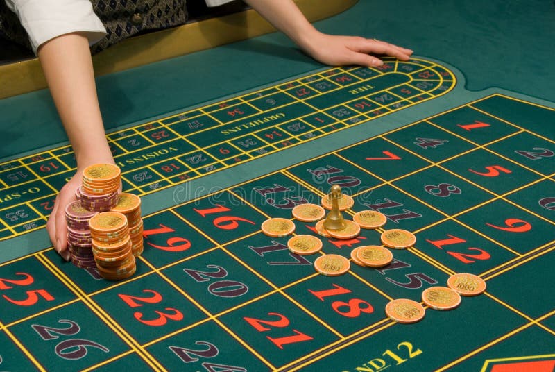 Casino Dealer Handling a Big Pile of Chips Stock Photo Image of