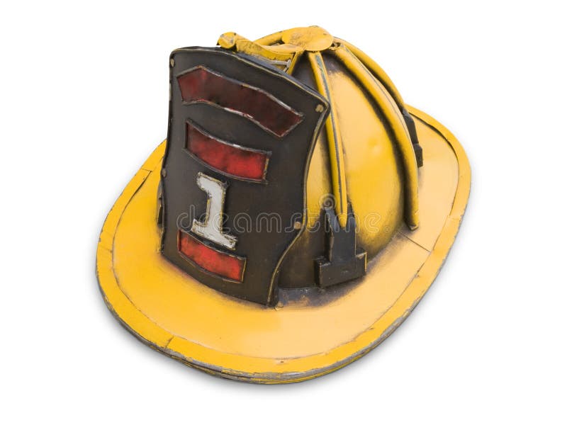 Old yellow fireman helmet isolated on white. Old yellow fireman helmet isolated on white.