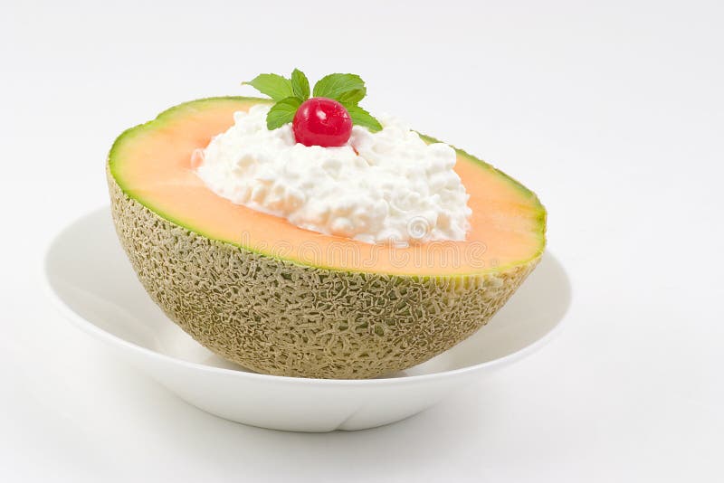 A half of a cantaloupe and a scoop of lite cottage cheese make for a nutritious morning or afternoon snack. A half of a cantaloupe and a scoop of lite cottage cheese make for a nutritious morning or afternoon snack.
