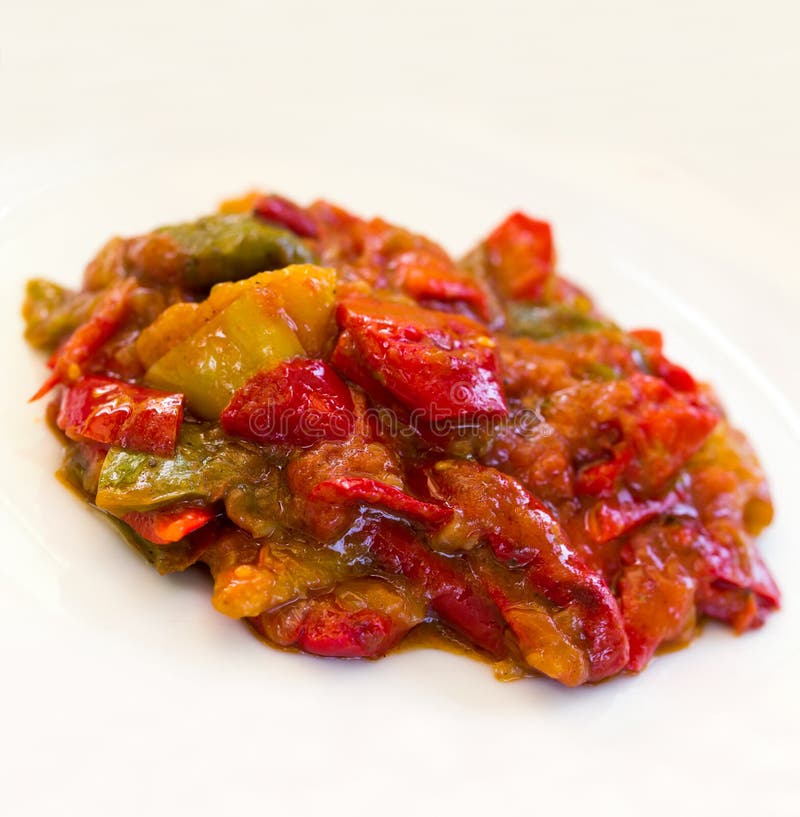 Casserole with grilled red bell pepper , close up