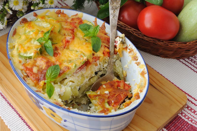 Casserole of Pasta with Zucchini and Tomato with Cheese Stock Image