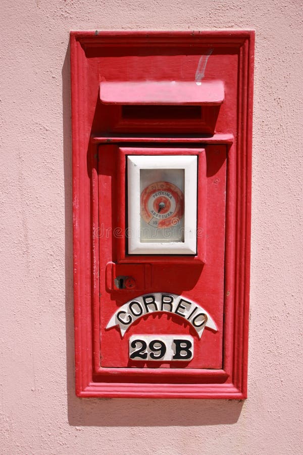 Old Red mail box in a wall. Old Red mail box in a wall