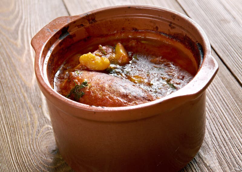 Cassoulet de Castelnaudary - slow-cooked casserole originating in the south of France, containing meat (typically pork sausages