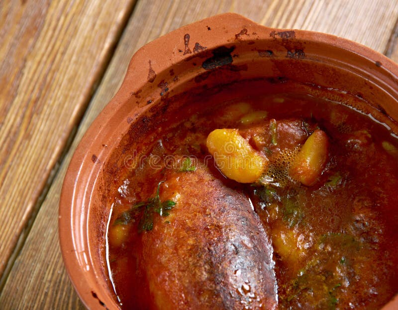 Cassoulet de Castelnaudary - slow-cooked casserole originating in the south of France, containing meat (typically pork sausages