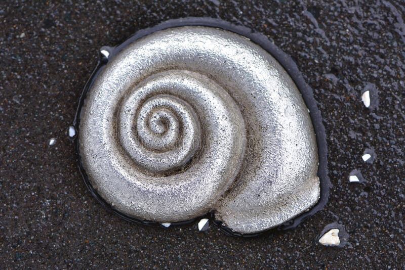 Cast alloy snail shell stock photography