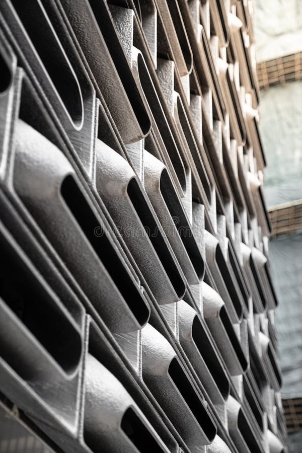 Cast aluminium facade unit system in random modular clad inside glass building in Hong Kong/ background texture / architectural ma stock images Cast aluminium facade unit system in random modular clad inside glass building in Hong Kong/ background texture / architectural ma stock images