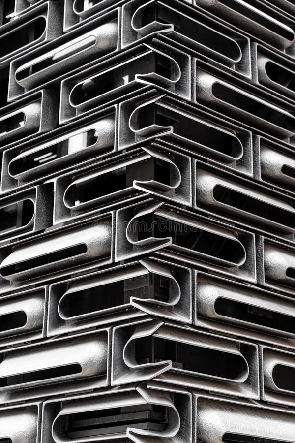 Cast aluminium facade unit system in random modular clad inside glass building in Hong Kong/ background texture / architectural ma stock image Cast aluminium facade unit system in random modular clad inside glass building in Hong Kong/ background texture / architectural ma stock image