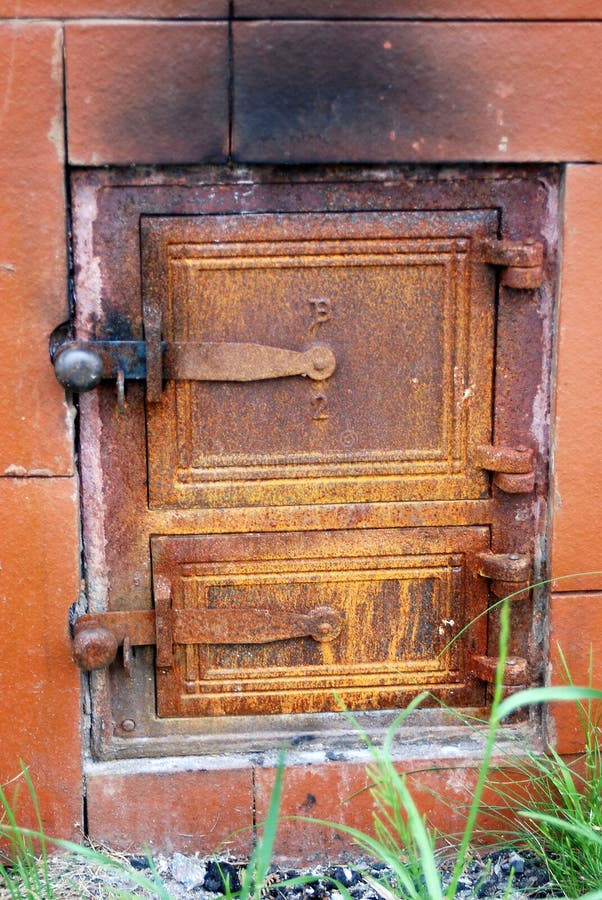 Cast iron door stock photo. Image of rust, hinges, oven 15878526
