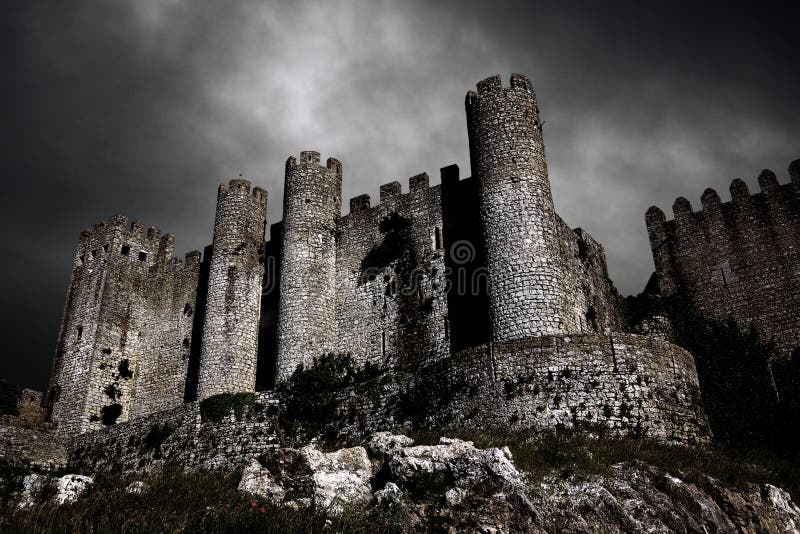 Disturbing landscape with medieval castle at night with stormy sky. Disturbing landscape with medieval castle at night with stormy sky