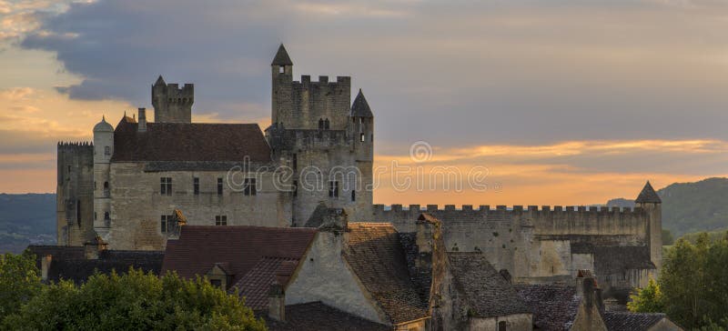 Majestic old castle of Beynac during the sunset in France (Perigord). Majestic old castle of Beynac during the sunset in France (Perigord)