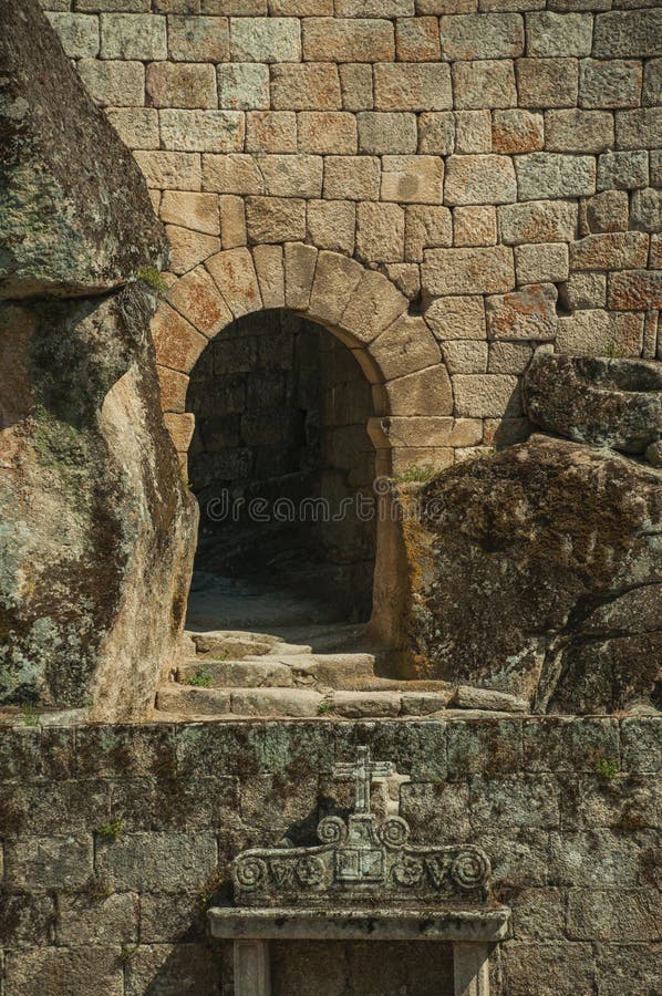 Castle facade with open gateway on stone wall royalty free stock photo Castle facade with open gateway on stone wall royalty free stock photo