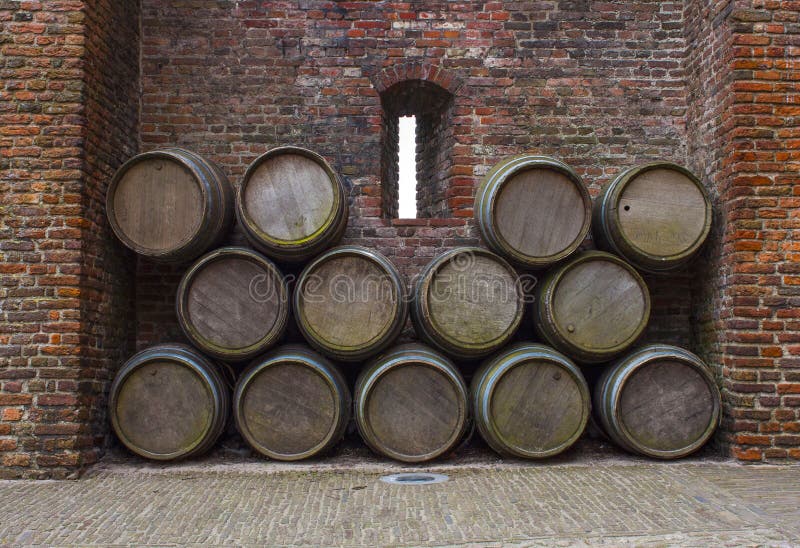 Castle wall porthole and barrels