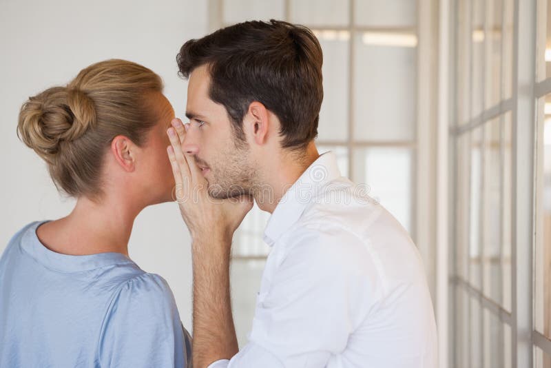 Casual business people gossiping together stock image Casual business people gossiping together stock image