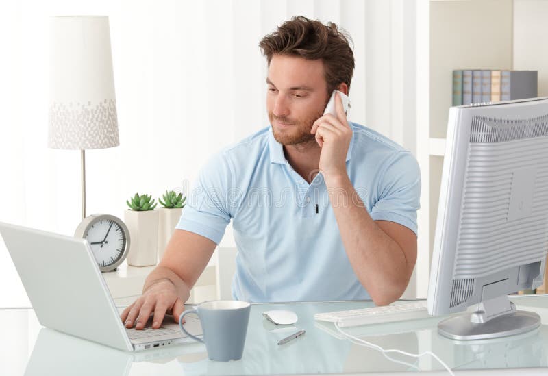 Casual businessman working in office royalty free stock photography
