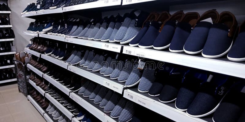 Casual Fashion Footwear Shoes Arrange on Rack in Showroom Stock Image ...