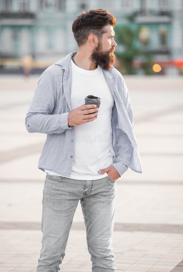Casual guy at coffee break in the street. photo of guy at coffee break. guy at coffee break royalty free stock photos