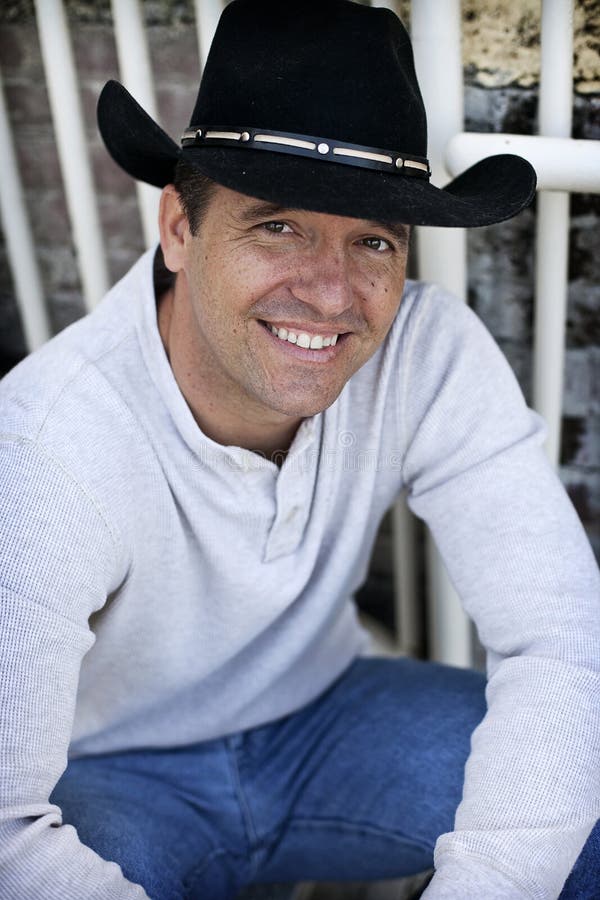 Casual man wearing cowboy hat stock image Casual man wearing cowboy hat stock image