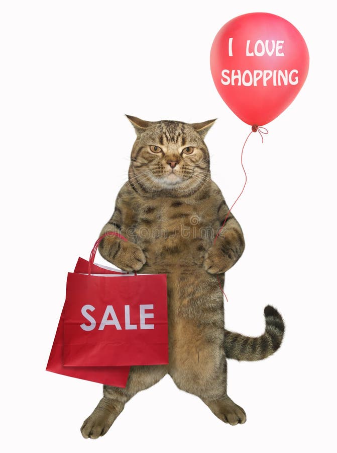 The cap is holding a bag and a red balloon with an inscription ` I love shopping `. White background. The cap is holding a bag and a red balloon with an inscription ` I love shopping `. White background.