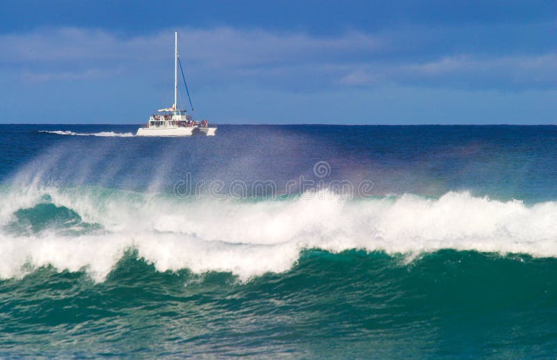 catamaran in big waves