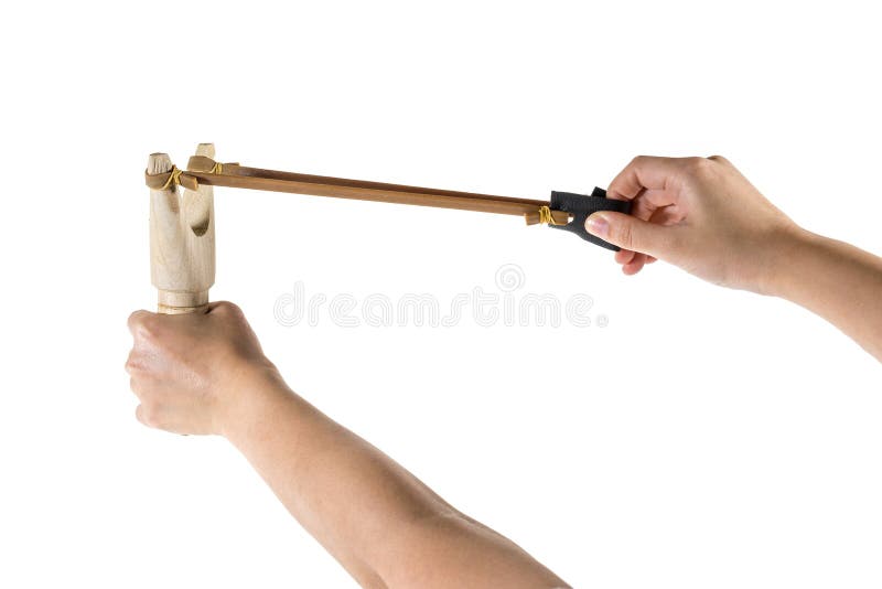 Catapult slingshot isolated on white background with kid hand pu royalty free stock photos