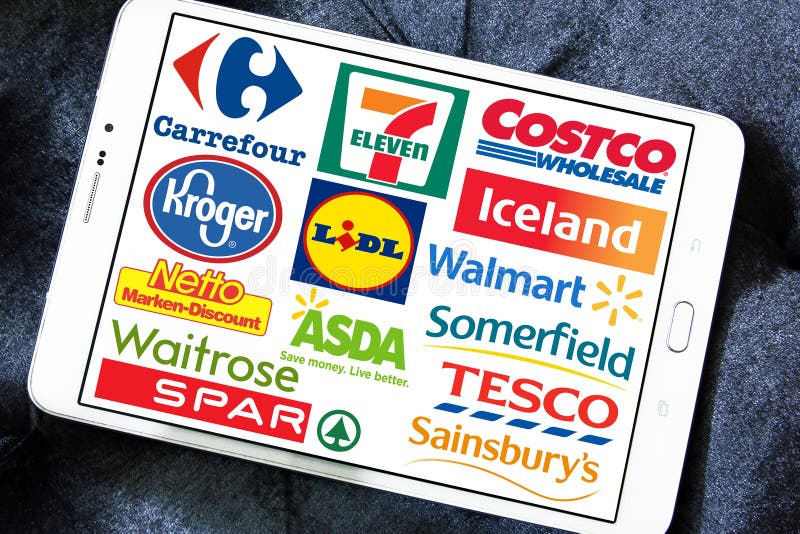 Collection of logos and brands of world's biggest supermarket chains and retails on white tablet. chains like carrefour, netto, tesco, iceland, lidl, costco, eleven, spar, asda, metro, somerfield, walmart. Collection of logos and brands of world's biggest supermarket chains and retails on white tablet. chains like carrefour, netto, tesco, iceland, lidl, costco, eleven, spar, asda, metro, somerfield, walmart