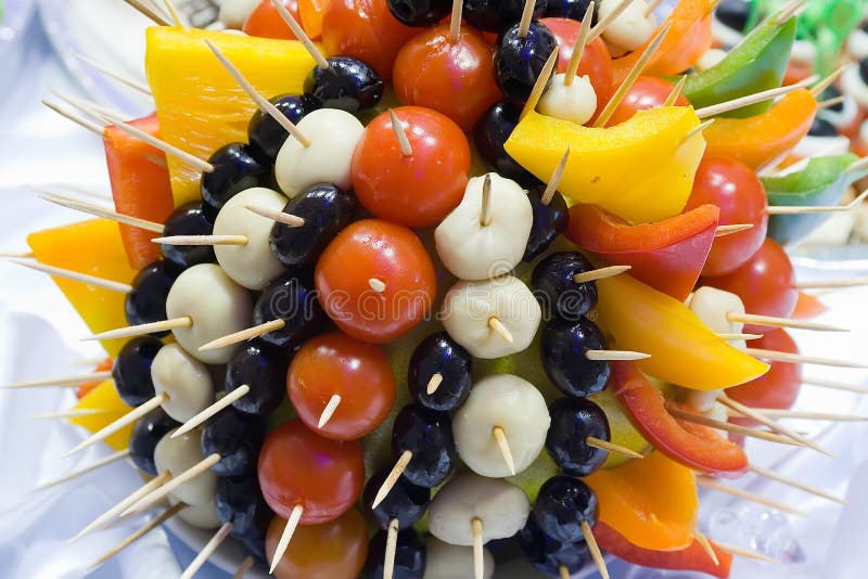 Catering buffet style - tomatoes and olives beautifully decorated on the plate. Catering buffet style - tomatoes and olives beautifully decorated on the plate