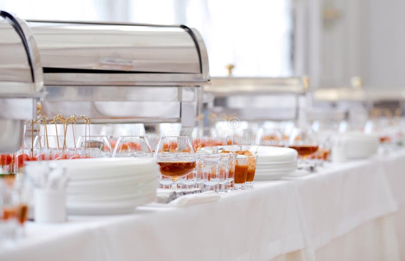 Catering food on table glasses and plates. High quality photo