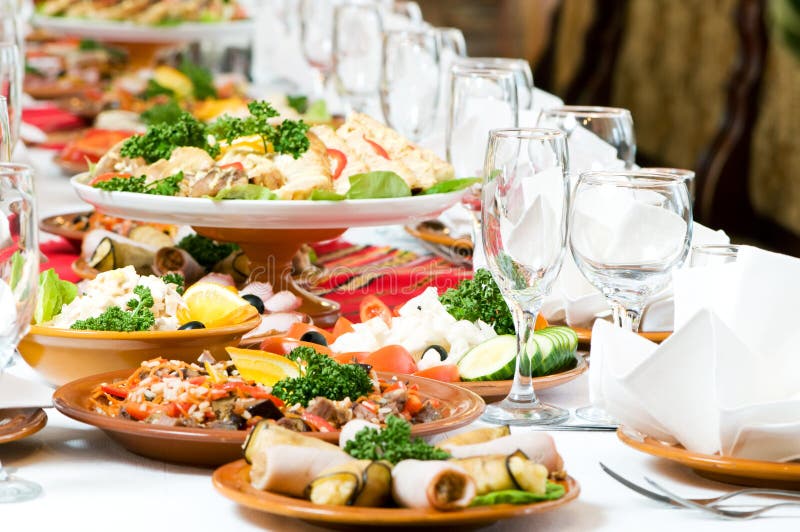 Catering table set service with silverware and glass stemware at restaurant before party. Catering table set service with silverware and glass stemware at restaurant before party