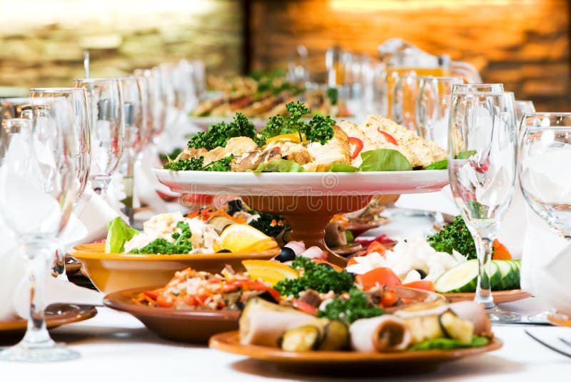 Catering table set service with silverware and glass stemware at restaurant before party. Catering table set service with silverware and glass stemware at restaurant before party