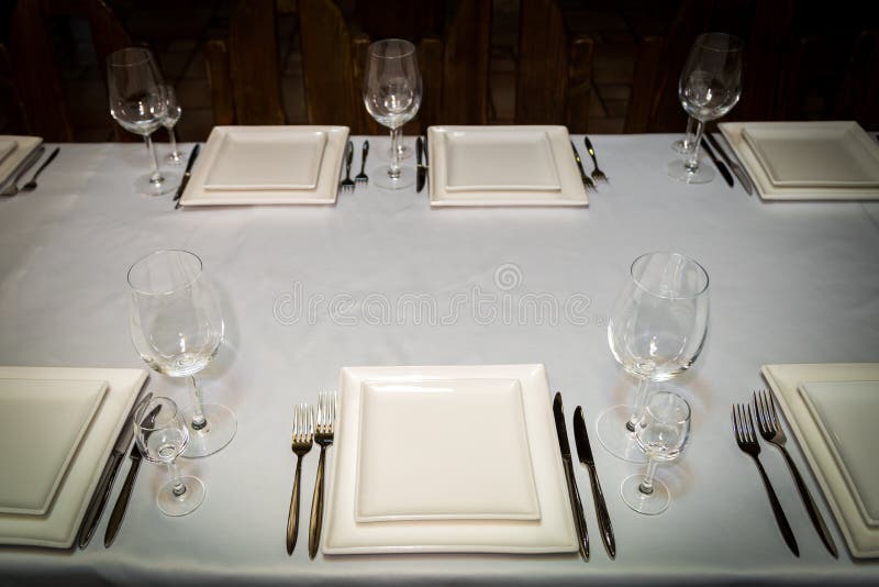 Catering Table Set Service with Silverware, Napkin and Glass at