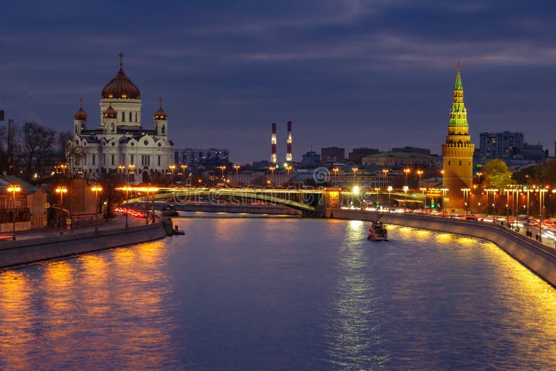 Cathedral of Christ the Saviour and towers of Moscow Kremlin on a background of Moskva river at night