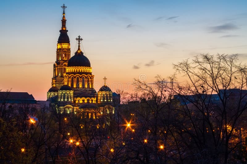 Cathedral church in Kharkiv, Ukraine at sunset with lights