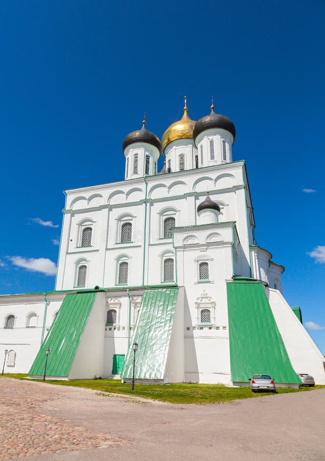 Classical Russian ancient religious architecture example. Trinity Cathedral located since 1589 in Pskov Krom or Kremlin. Orthodox Church facade