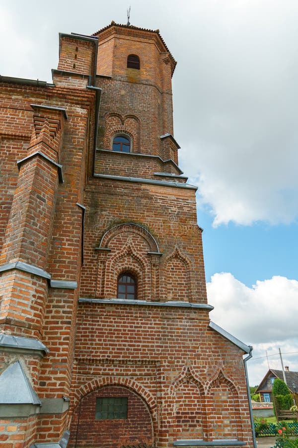 The Catholic church. The old red brick church. A historical building with a religious purpose royalty free stock images