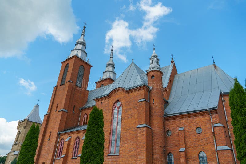 The Catholic church. The old red brick church. A historical building with a religious purpose stock photography