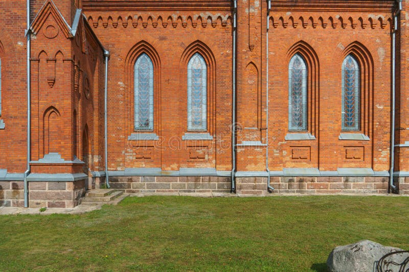 The Catholic church. The old red brick church. A historical building with a religious purpose royalty free stock image
