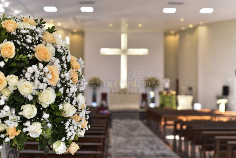 Catholic Church Prayer Altar with Flower Arrangements and Cross in the  Background Stock Photo - Image of building, green: 175659426