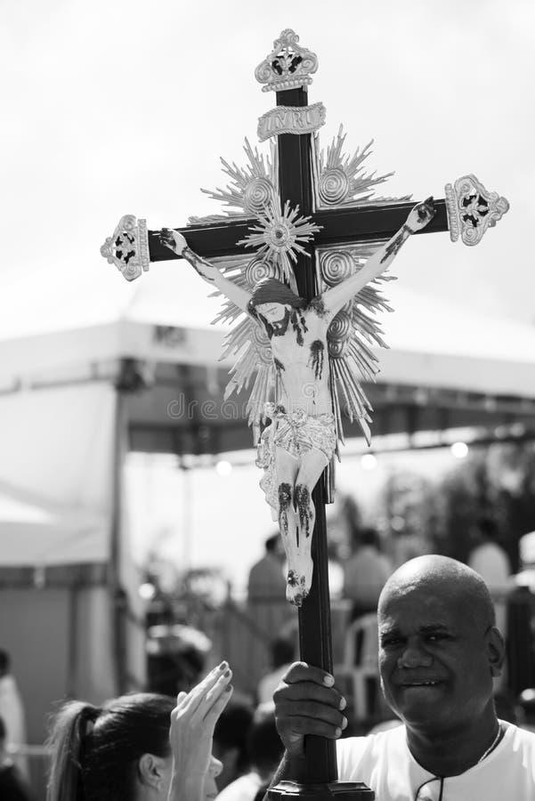 Catholics Touching The Image Of Jesus Christ During Mass At Senhor Do